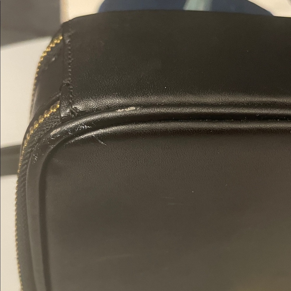 Elegant Black Crossbody Bag with Gold Accents - Picture 8 of 11